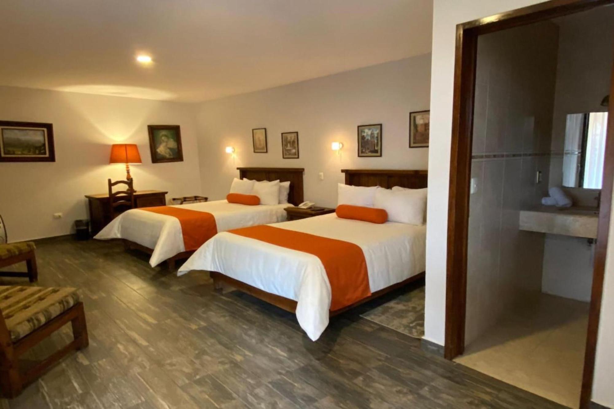 Capital O La Huerta Golf & Hotel Cholula Exterior photo